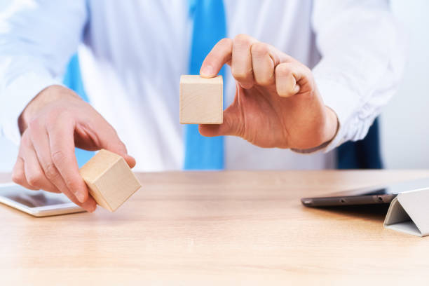 istock Wooden cubes on the desktop 1220610668