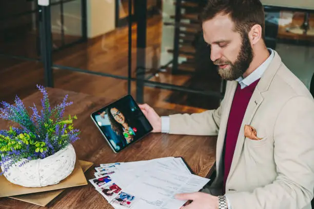 Photo of Human Resources manager recruiting on video call, COVID-19 pandemic