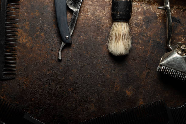 istock vintage barber tools dangerous razor hairdressing scissors old manual clipper comb shaving brush. 1220615432
