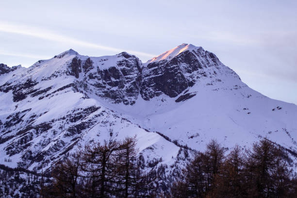 istock the snowy Pelvo d'Elva at sunset 1220616961