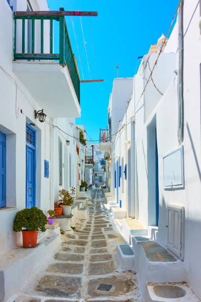 istock Street with whitewashed houses in Mykonos 1220618026