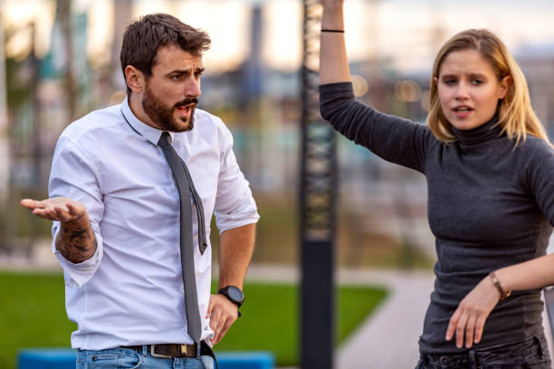 istock Young Couple with Communication Problems is Arguing Outdoors 1220619596