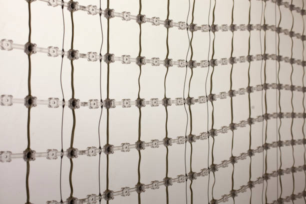 istock Abstract industrial background from square cells, mesh. 1220619788