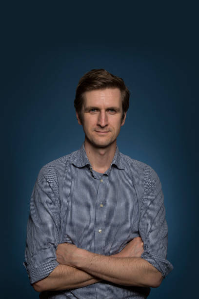 istock Caucasian Office Worker Portrait with Arms Crossed 1220623413
