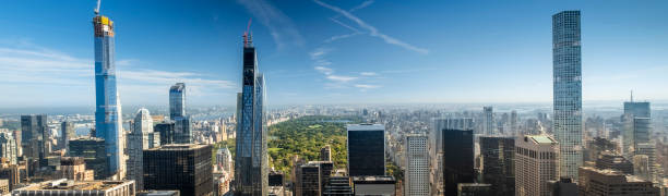 Downtown Manhattan cityscape view in New York City USA Aerial panoramic view of the buildings and skyscrapers over Central Park and the Manhattan skyline in New York City USA new york city built structure building exterior aerial view stock pictures, royalty-free photos & images