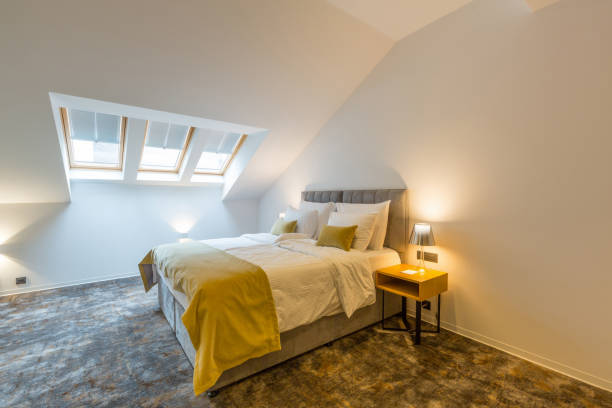 istock Interior of a loft double bed hotel bedroom 1220624566