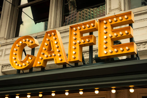 istock Light bulb cafe coffee shop sign 1220625025