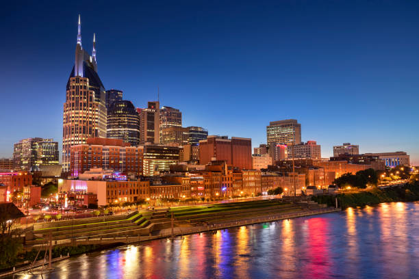 Nashville Tennessee USA downtown city skyline City of Nashville Tennessee on the Cumberland River in Tennessee USA at night nashville skyline stock pictures, royalty-free photos & images