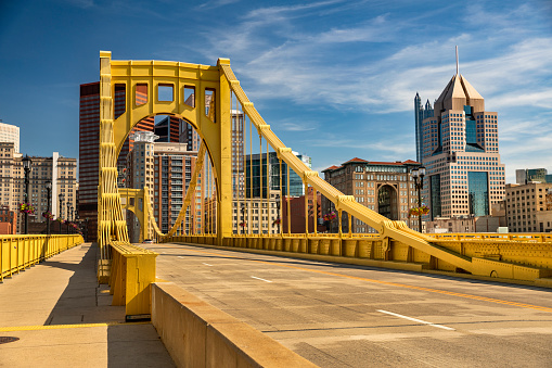 Downtown skyline and the Roberto Clemente Bridge in Pittsburgh Pennsylvania USA