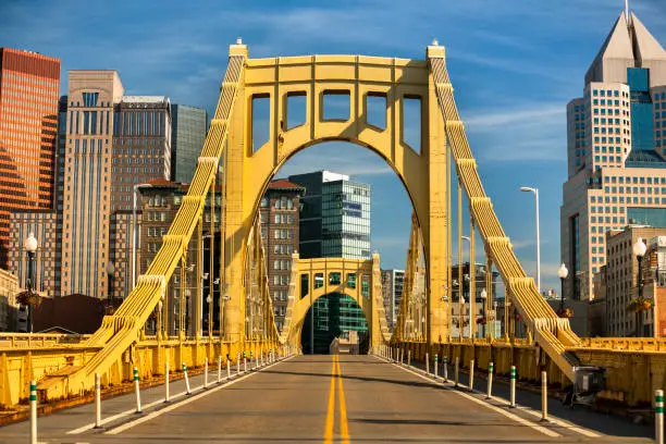 Photo of Downtown skyline and the Roberto Clemente Bridge in Pittsburgh Pennsylvania USA