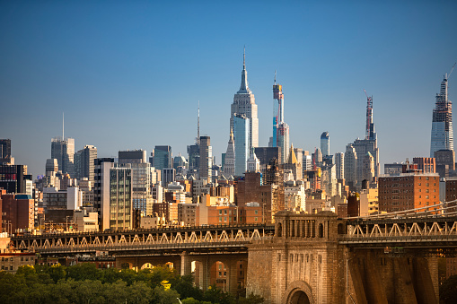 Manhattan Bridge skyline view over the East River connecting Manhattan New York City to Brooklyn