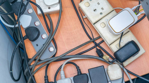 istock Tangled wires and the extension cable on the table 1220629320