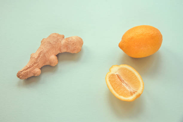 istock Lemon and Ginger on blue background, home remedies concept 1220632418