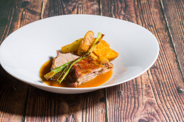istock Roasted veal with fried potato served on a restaurant table 1220635232
