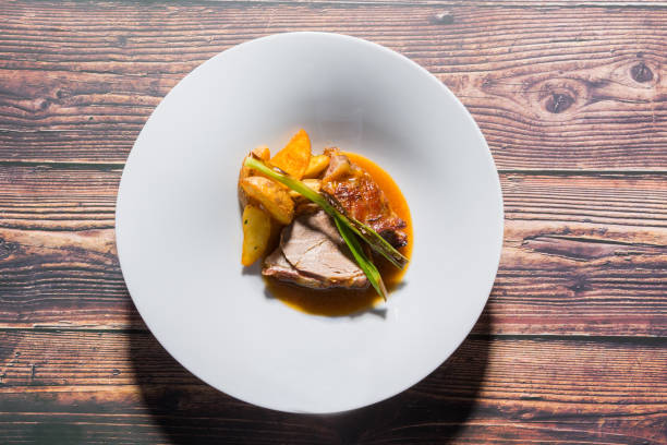istock Roasted veal with fried potato served on a restaurant table 1220635233