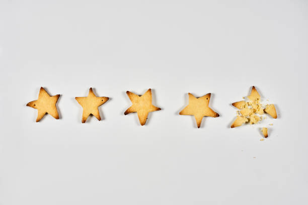 4つ星ランキング。4焼き星形クッキー - rating star shape ranking four objects ストックフォトと画像