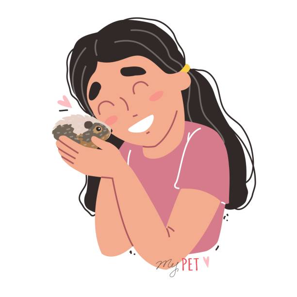 istock little girl holding a hamster in her arms 1220637317