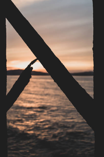 istock View of the supporting structure of a jetty stretching from the shoreline 1220639606