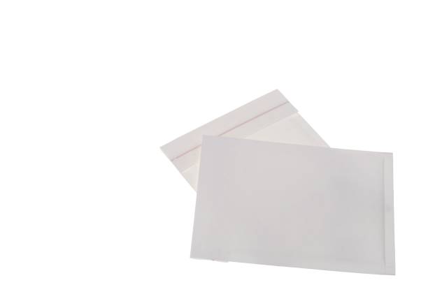 istock Close up view of empty white envelopes isolated. Packaging concept. 1220644251