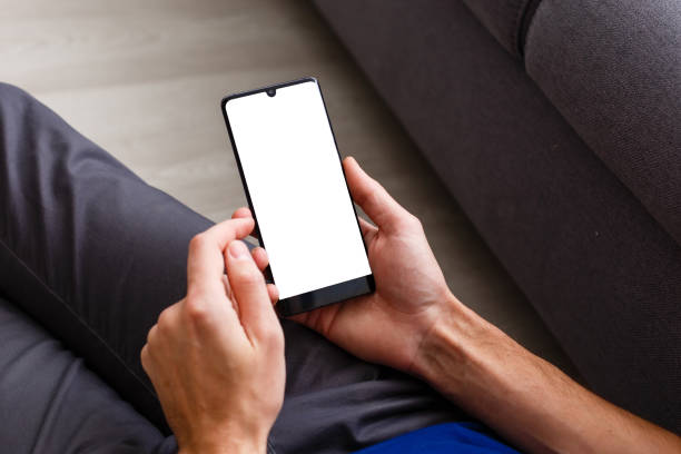 istock Young adult using mobile smart phone 1220644551