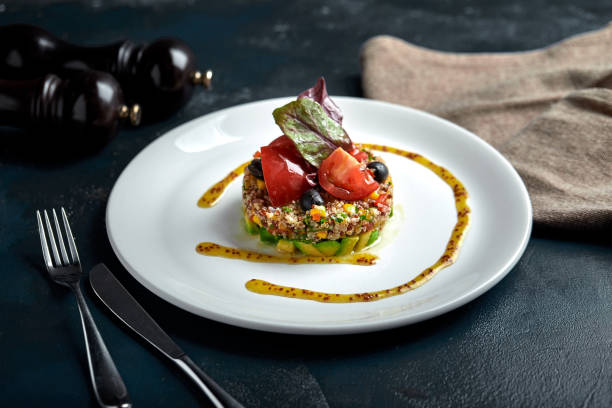 istock Delicious quinoa salad with avocado and tomatoes. Macro 1220644664