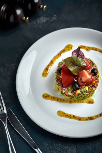 istock Delicious quinoa salad with avocado and tomatoes. Macro 1220644682