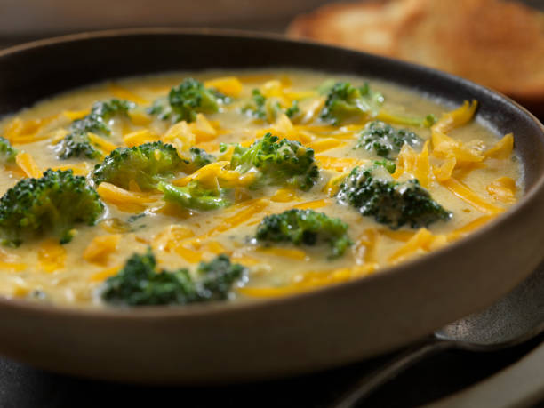 istock Creamy Broccoli and Cheddar Soup with Crusty Bread 1220648930
