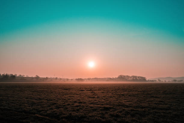 Colorful sunrise on the wide field