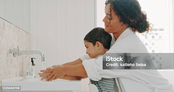 We Make Sure We Wash Our Hands Regularly Stock Photo - Download Image Now - Washing Hands, Child, Mother