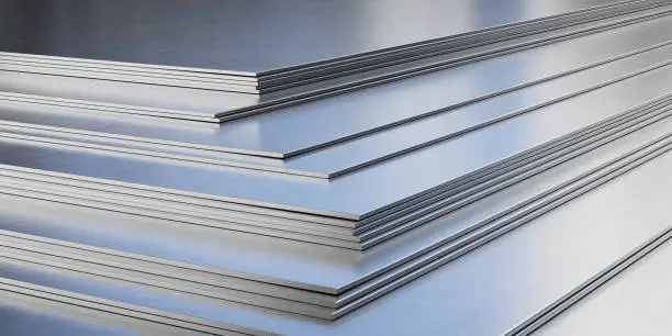 Photo of Steel sheets in warehouse, rolled metal product.