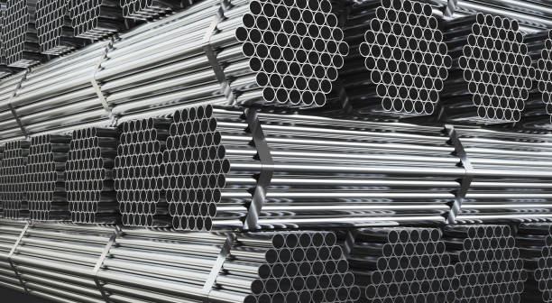istock Stack of steel pipes in warehouse. Rolled metal products. 1220653785
