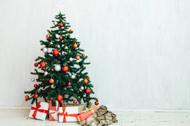 istock Christmas decoration Christmas tree new year presents holiday interior 1220653894