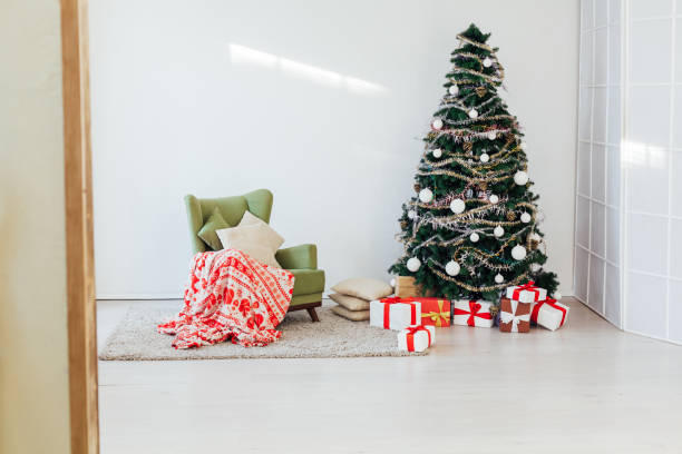 istock Christmas decoration Christmas tree new year presents holiday interior 1220654088