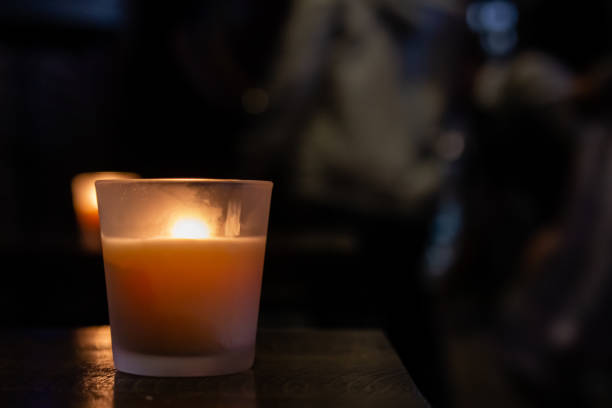 istock Close up of Candle Burning with Blurred Background 1220656373
