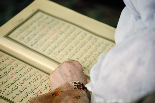 Muslim woman praying in Ramadan
