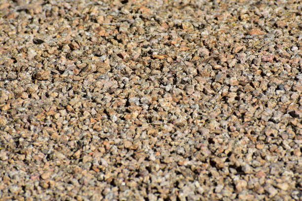 istock Brown Tan rock stone pebble background 1220658267