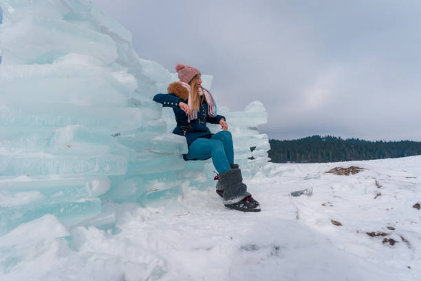 istock Fashion model sitting in her ice throne 1220658623