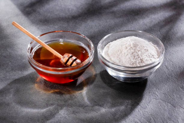 istock Honey and baking soda mask to remove stains 1220659968
