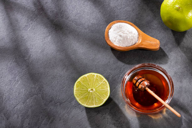 istock Honey, lemon and baking soda for face mask 1220659978