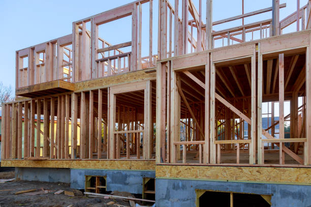 istock Private residential house with wooden frame under construction house 1220660657