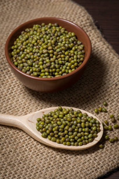 istock Mung beans in a bowl and spoon 1220661056