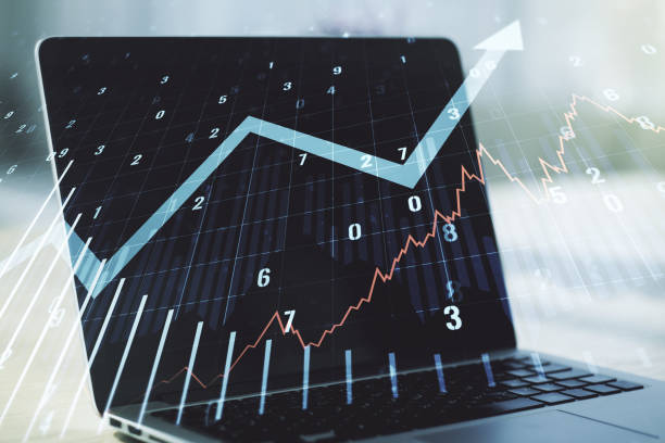 istock Abstract creative financial graph with upward arrow on modern computer background, financial and trading concept. Multiexposure 1220662115