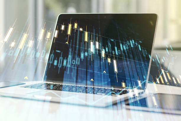 istock Double exposure of abstract creative financial chart on modern laptop background, research and strategy concept 1220662159
