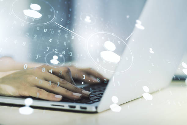 istock Social network concept with hands typing on laptop on background. Multiexposure 1220664100