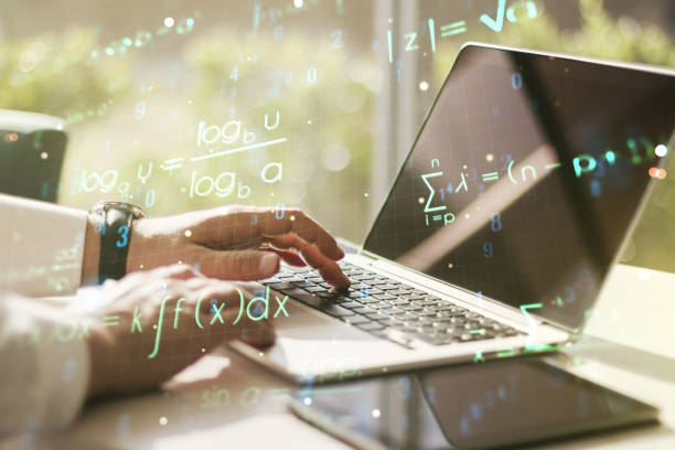 istock Double exposure of creative scientific formula concept with hands typing on laptop on background, research and development concept 1220664118