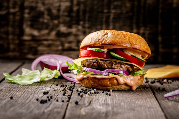 Close-up of home made tasty burger Close-up of home made tasty burger. cheeseburger photos stock pictures, royalty-free photos & images
