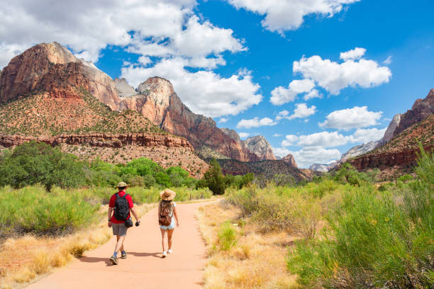 istock People hiking in the mountains on summer vacation. 1220667188