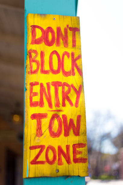 istock Rustic Homemade TOW ZONE Sign 1220668939