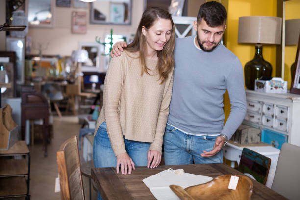 istock Couple looking for table in shop 1220670176