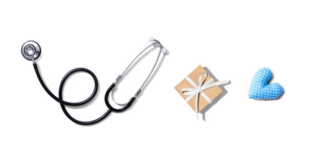 istock Stethoscope with a gift and a heart cushion 1220673926